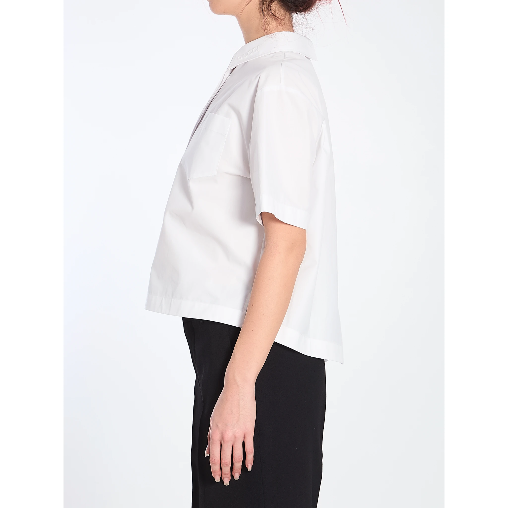 Shirt with embossed logo