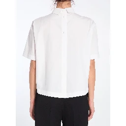 Shirt with embossed logo