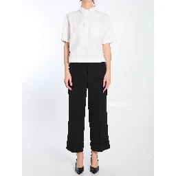 Shirt with embossed logo