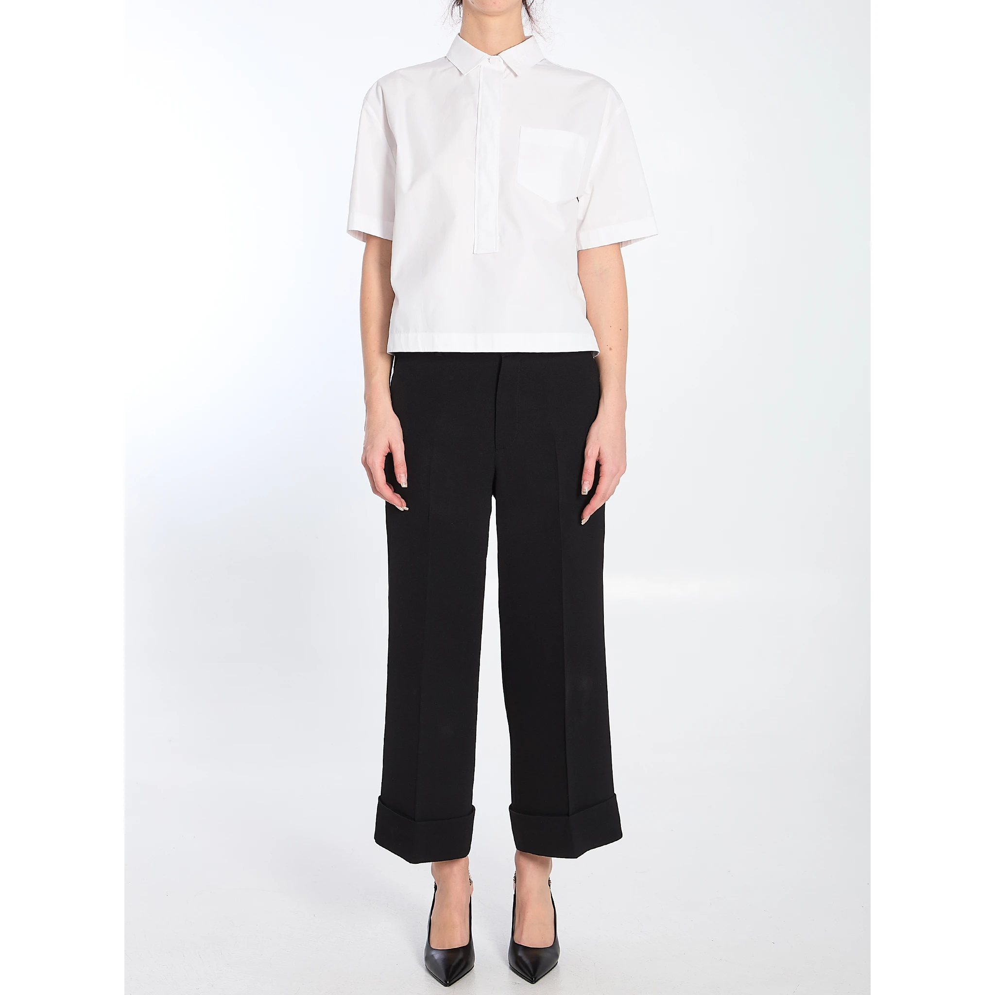 Shirt with embossed logo