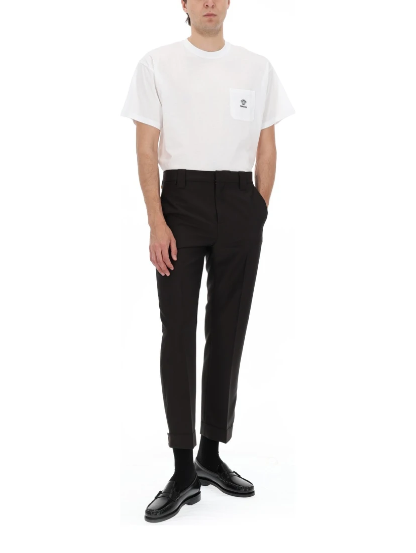 T-SHIRT CON TASCHINO E LOGO