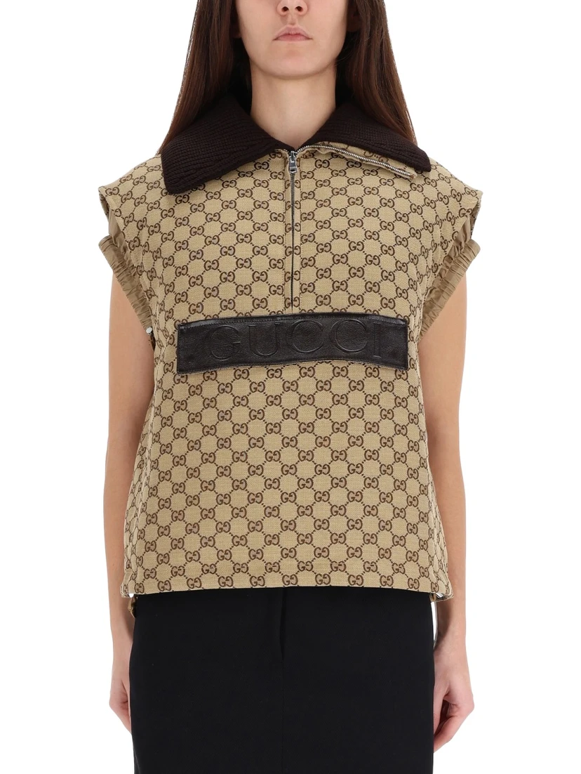 VEST WITH LEATHER LABEL