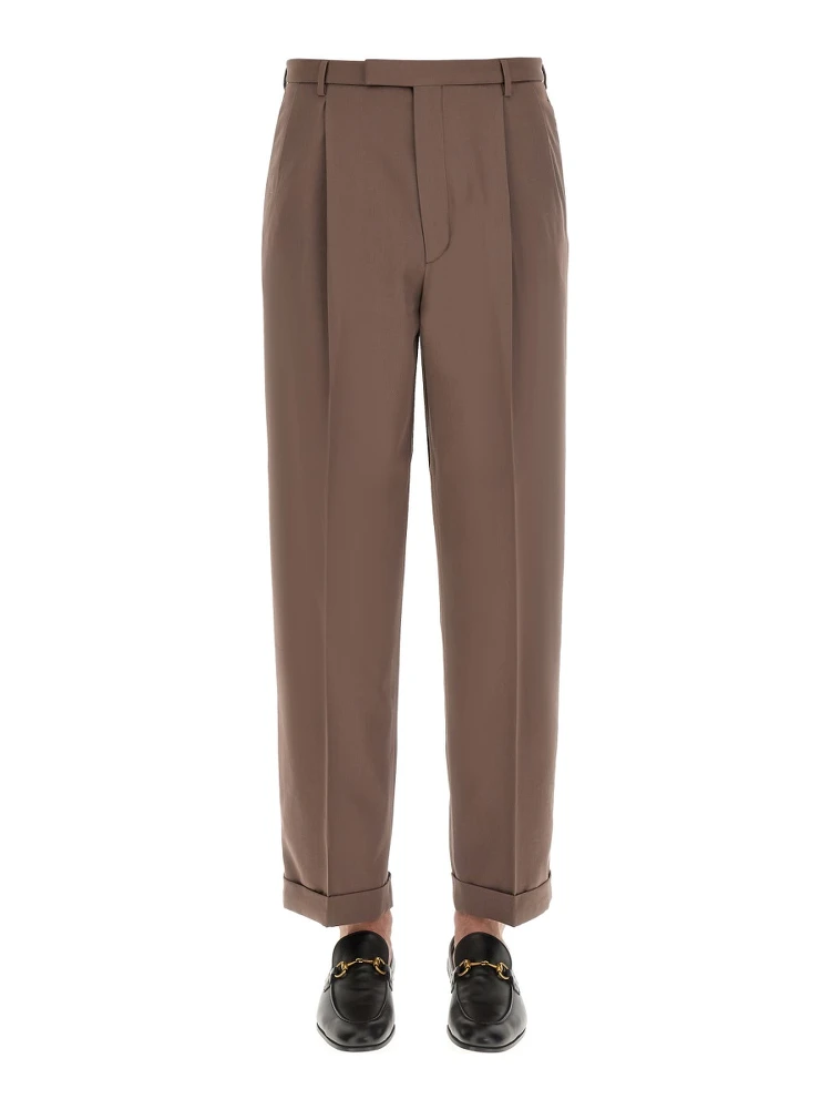 PANTS WITH GUCCI LABEL