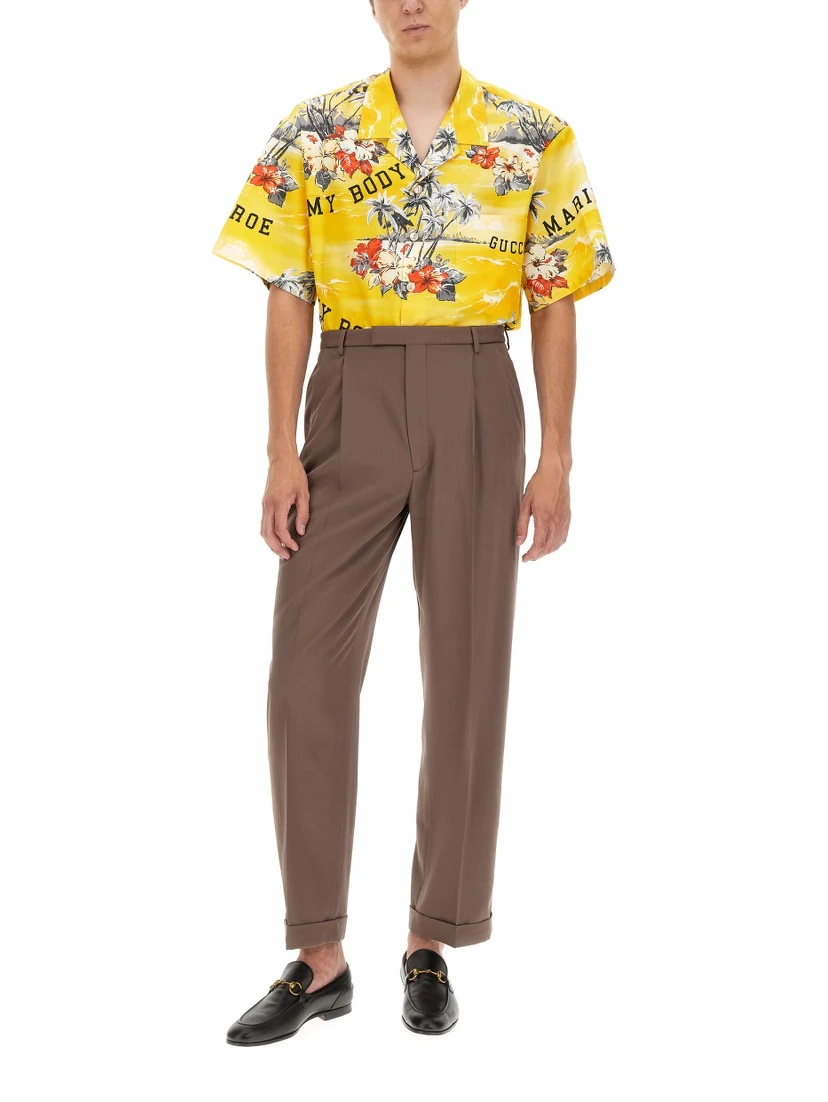 PANTS WITH GUCCI LABEL