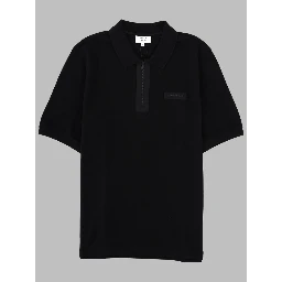 POLO CON ZIP E PATCH LOGO
