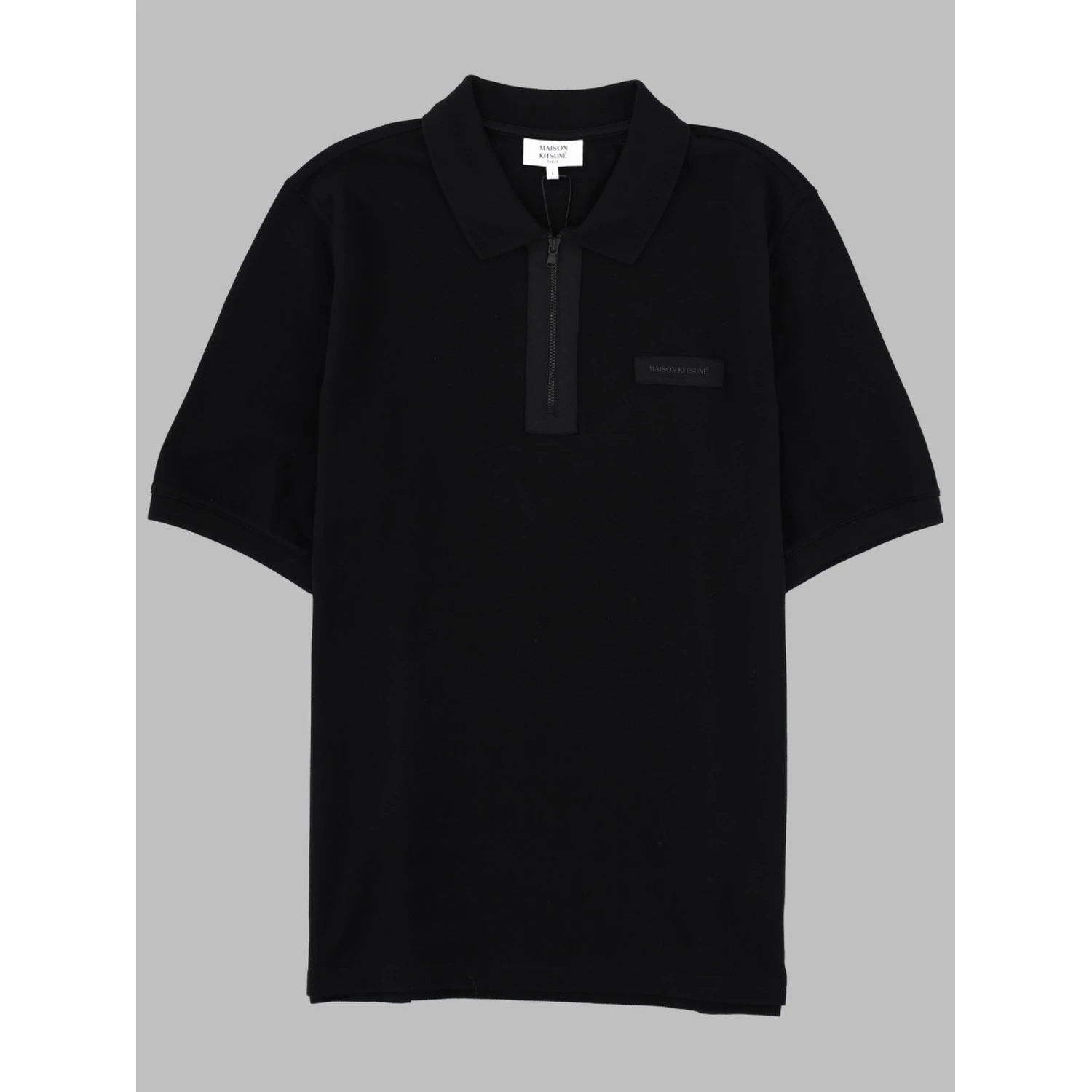 POLO CON ZIP E PATCH LOGO