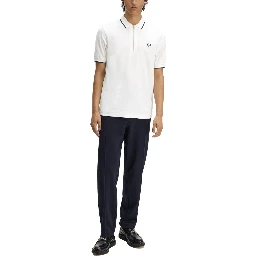 POLO CON ZIP E LOGO
