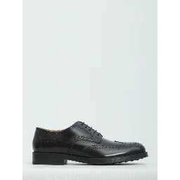 Laced up shoes with perforations