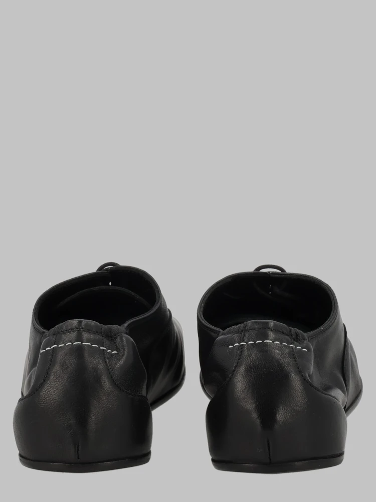 STRINGATA IN PELLE alternative
