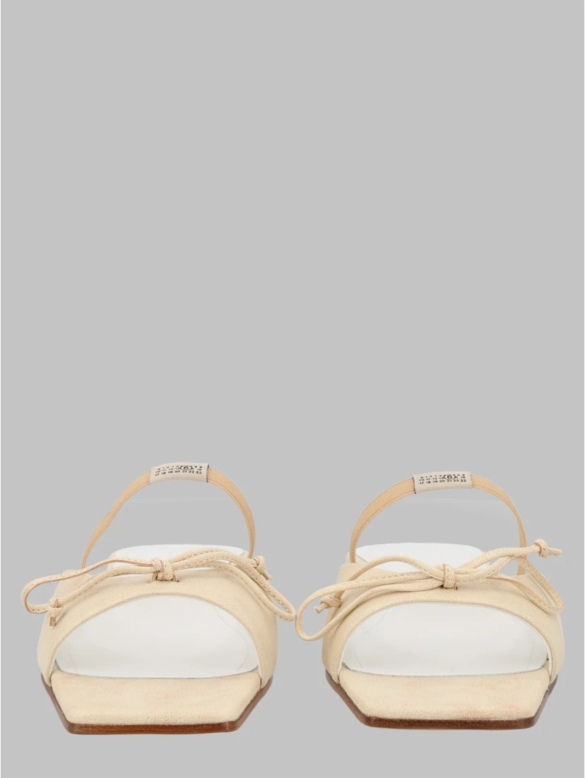 SANDALO SLINGBACK CON DETTAGLIO A FIOCCO