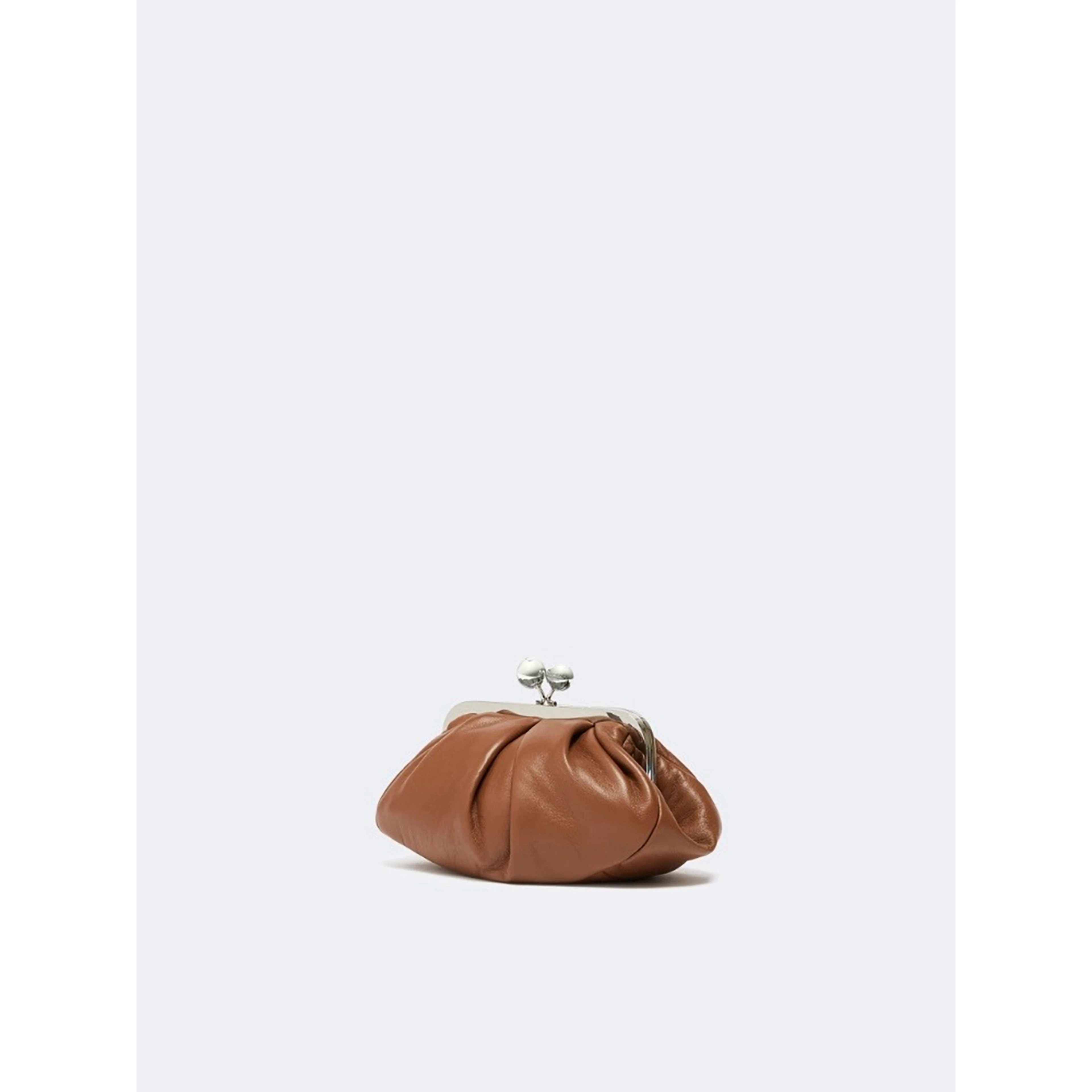 WEEKEND MAX MARA is accompanied by a handbag