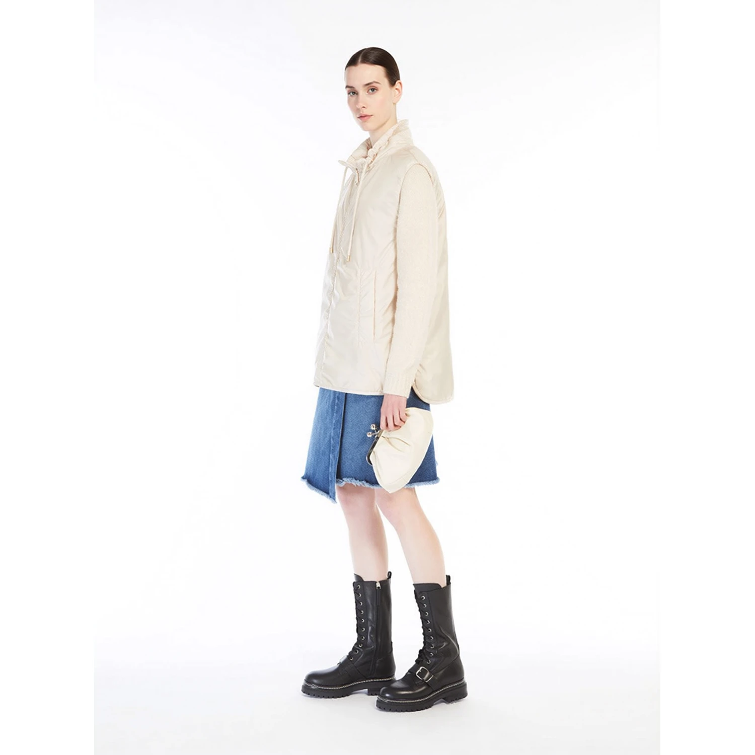 WEEKEND MAX MARA is accompanied by a handbag