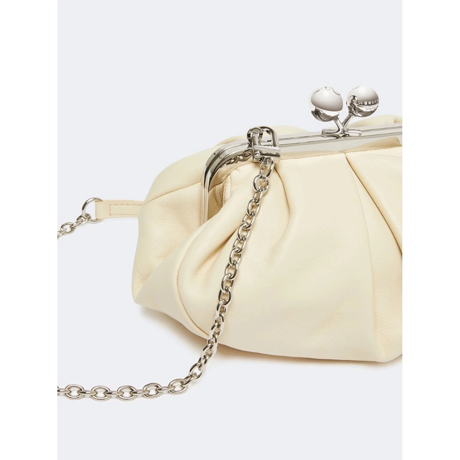 WEEKEND MAX MARA is accompanied by a handbag