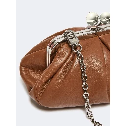 WEEKEND MAX MARA is accompanied by a handbag
