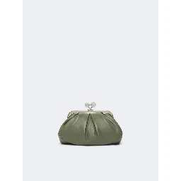 WEEKEND MAX MARA is accompanied by a handbag
