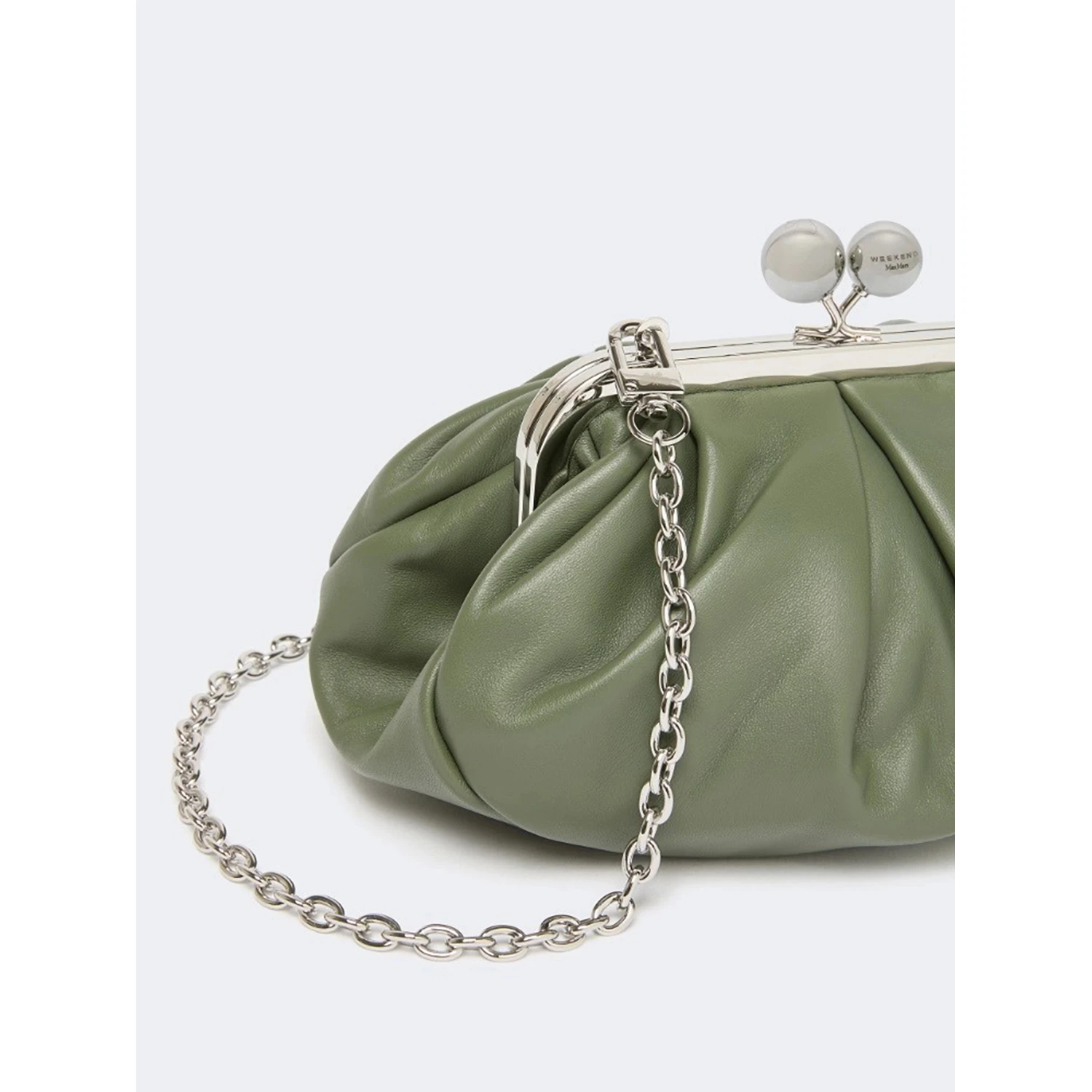 WEEKEND MAX MARA is accompanied by a handbag