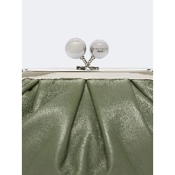 WEEKEND MAX MARA is accompanied by a handbag
