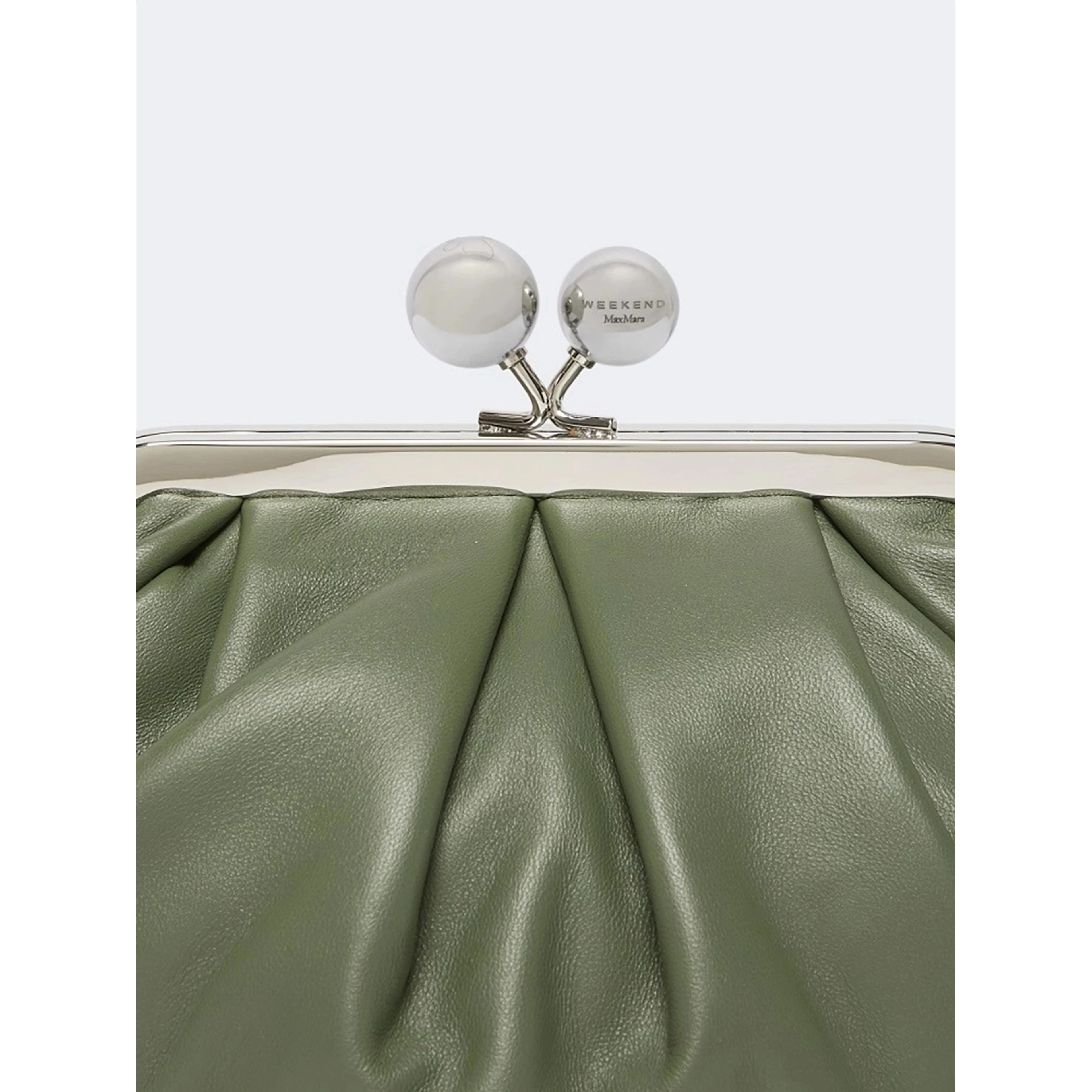 WEEKEND MAX MARA is accompanied by a handbag