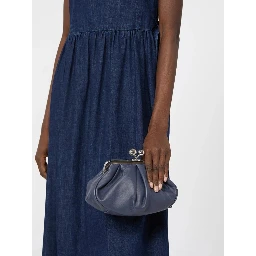 WEEKEND MAX MARA is accompanied by a handbag