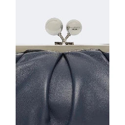 WEEKEND MAX MARA is accompanied by a handbag