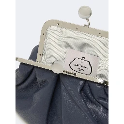 WEEKEND MAX MARA is accompanied by a handbag