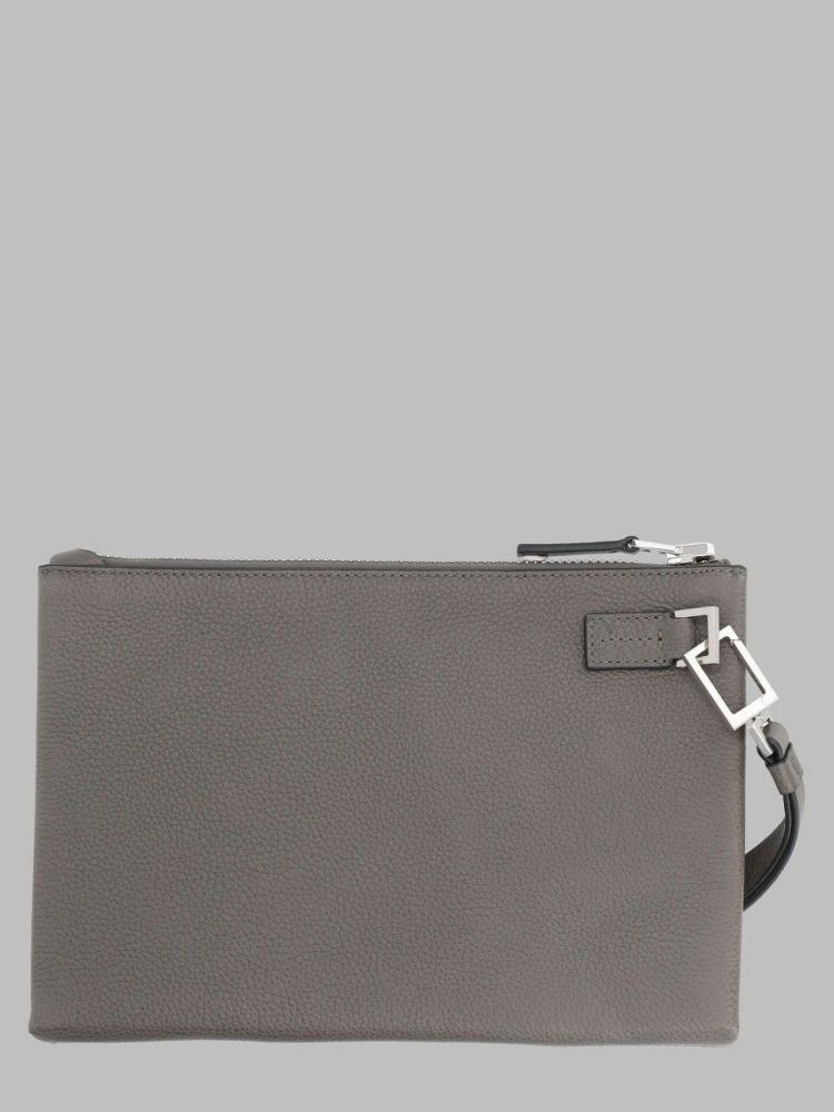POUCHETTE MINIMAL SOTTILE IN PELLE FIORE CON CINTURINO DA POLSO alternative