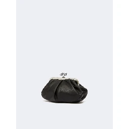 WEEKEND MAX MARA is accompanied by a handbag