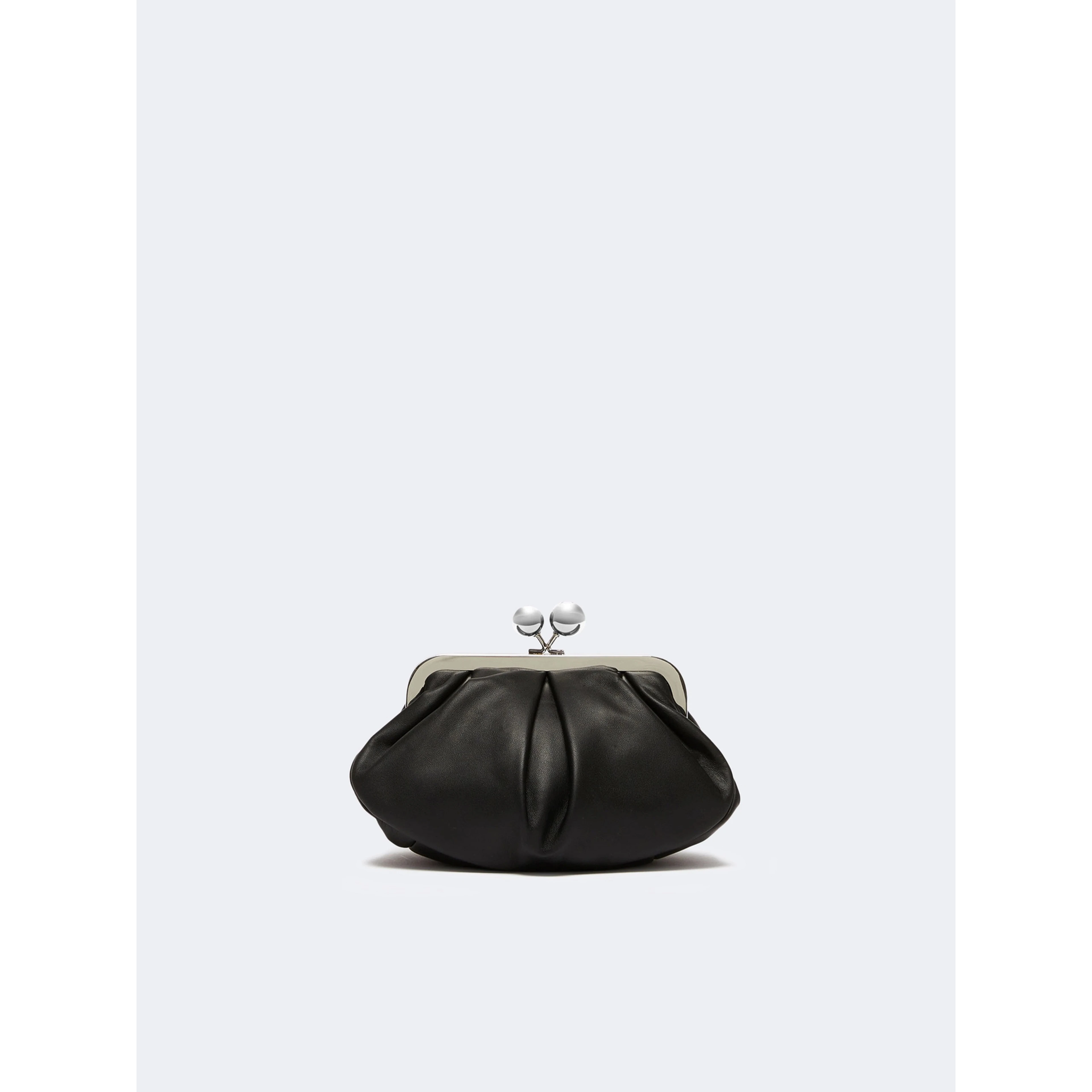 WEEKEND MAX MARA is accompanied by a handbag