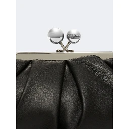 WEEKEND MAX MARA is accompanied by a handbag