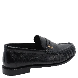 SAINT LAURENT Flat shoes Black