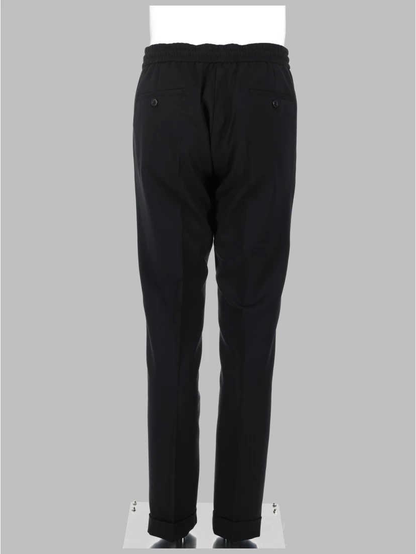 PANTALONE "A SUIT TO TRAVEL IN"