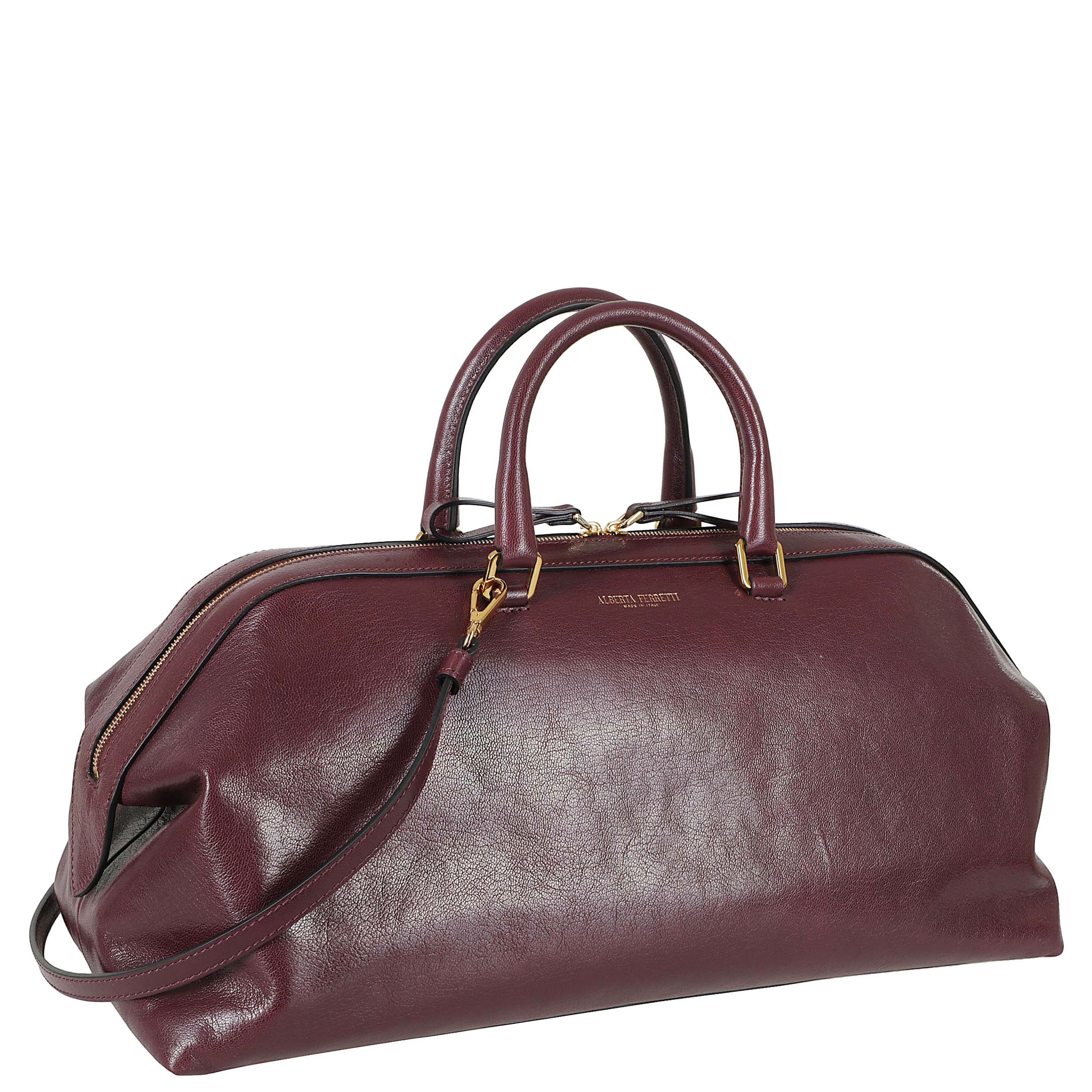 BORSA CON MANICI CAPRA