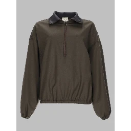 GIACCA CON ZIP A TRE QUARTI