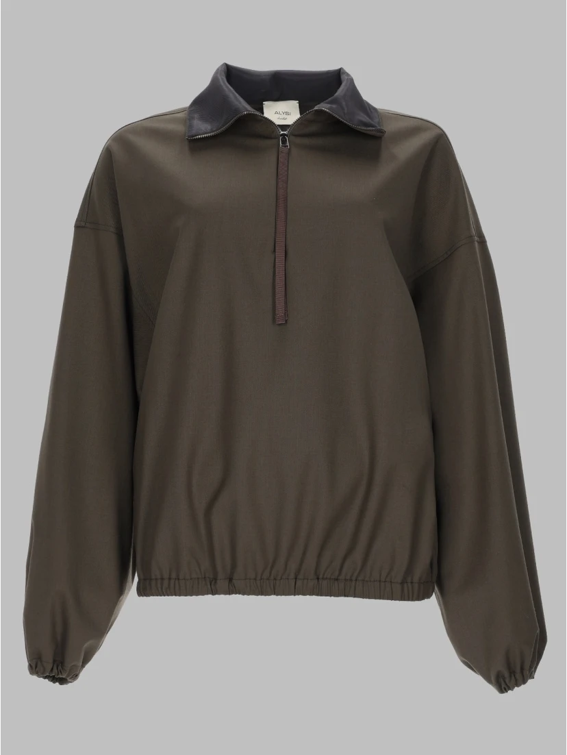 GIACCA CON ZIP A TRE QUARTI