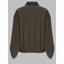 GIACCA CON ZIP A TRE QUARTI