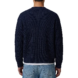 Navy blue wool cardigan over