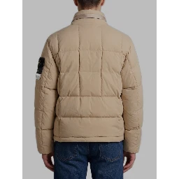 Beige cotton and nylon canvas down jacket.