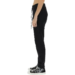 JOGGING PANTS WITH SPRAY PRINT ORB