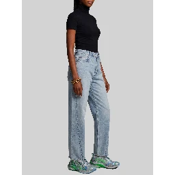 Light blue faded jeans with twisted seams