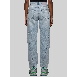 Light blue faded jeans with twisted seams