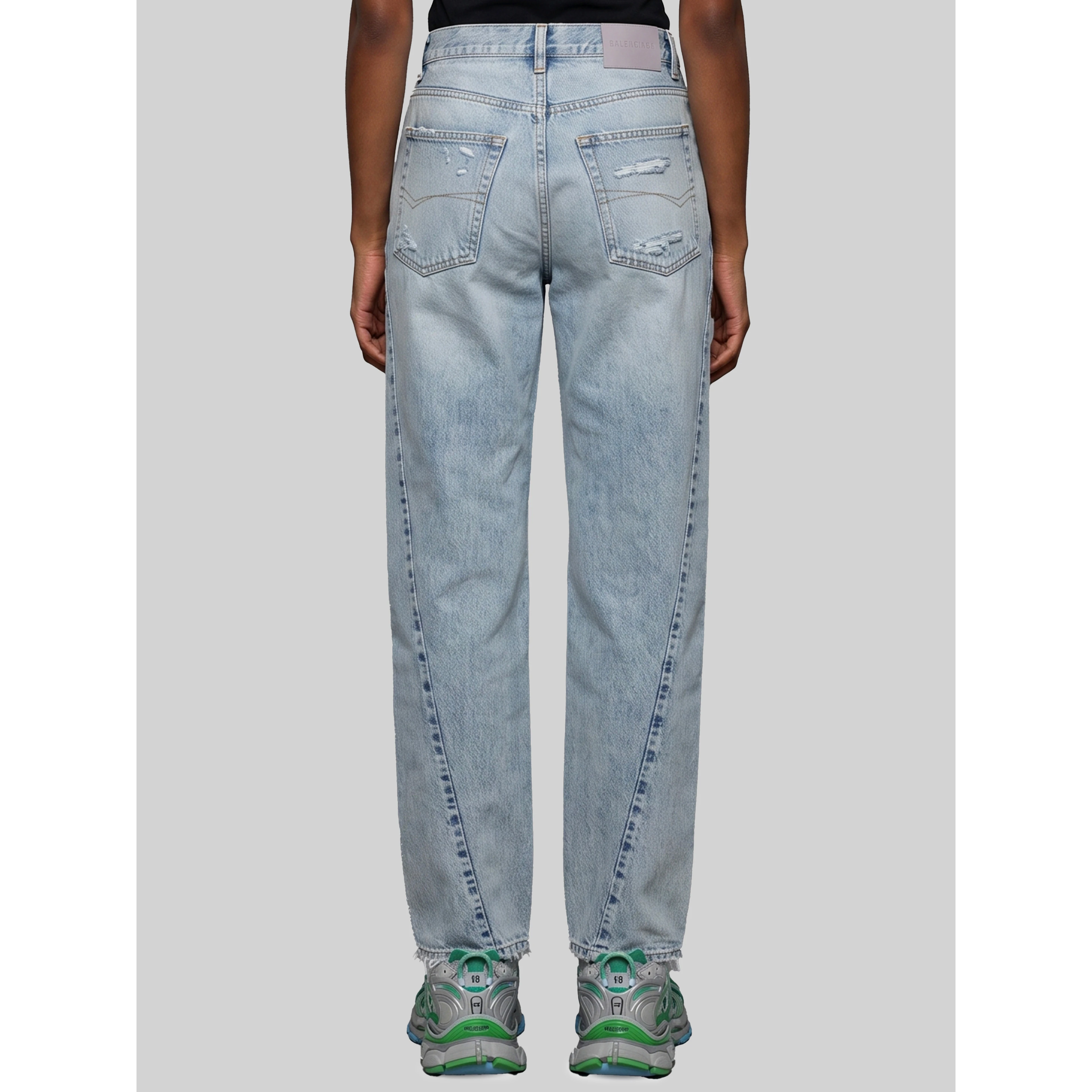 Light blue faded jeans with twisted seams