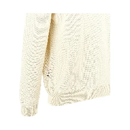 Cotton sweater with distressed finishes