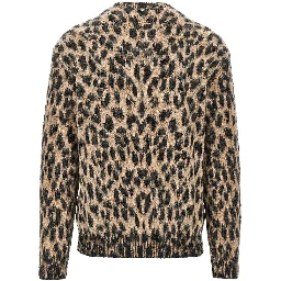 Knitted sweater with spotted motif