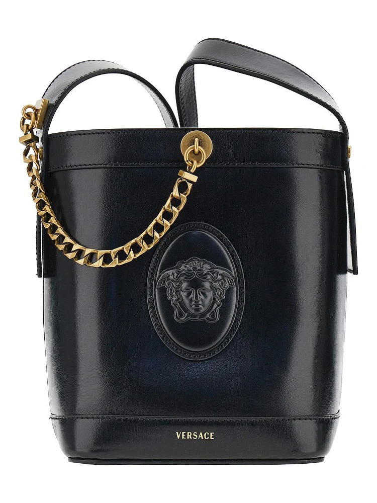 Leather bucket bag with Medusa patch