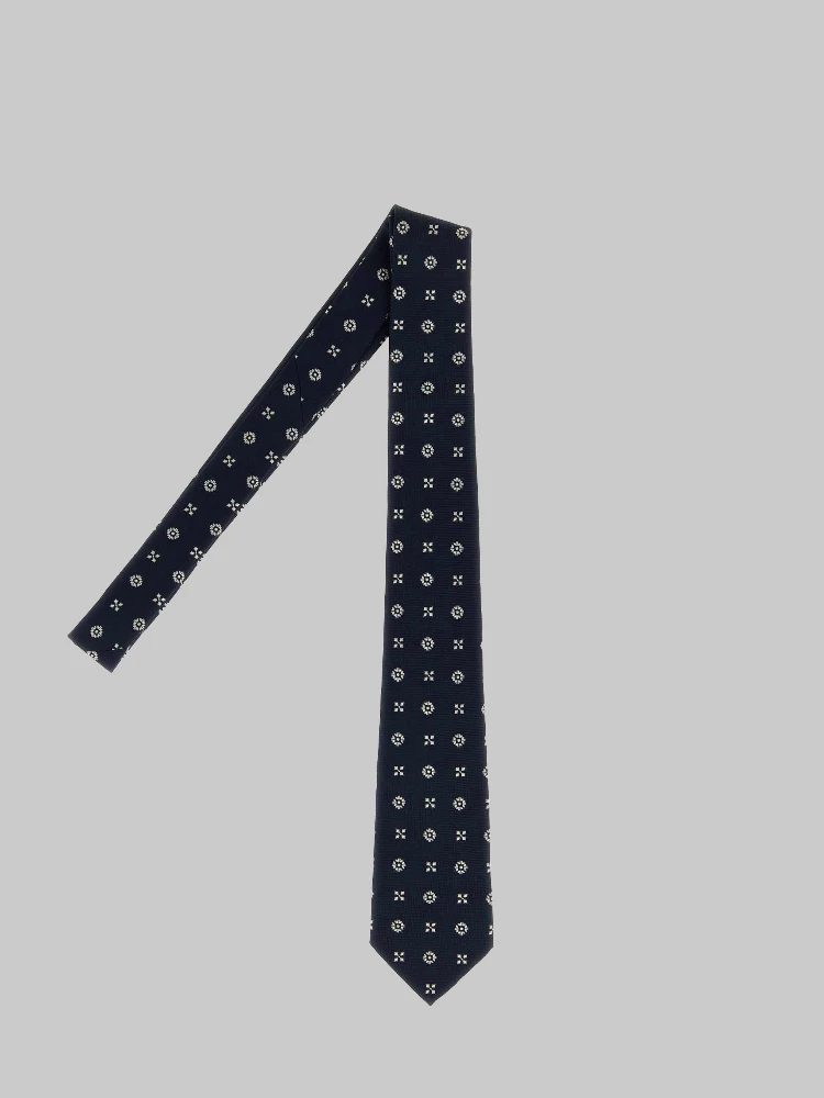 Tie with small embroideries