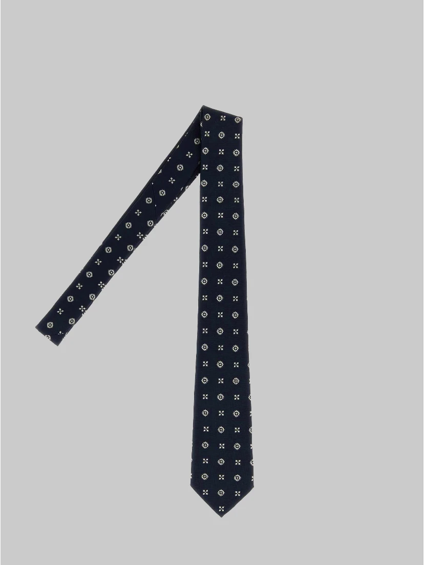 Tie with small embroideries