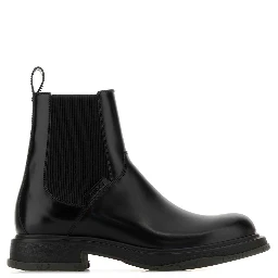 LEATHER UPPER AND RUBBER SOLE BOOTIE