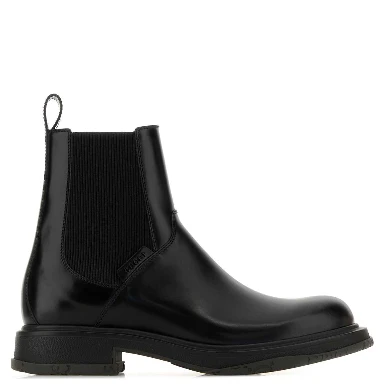 LEATHER UPPER AND RUBBER SOLE BOOTIE
