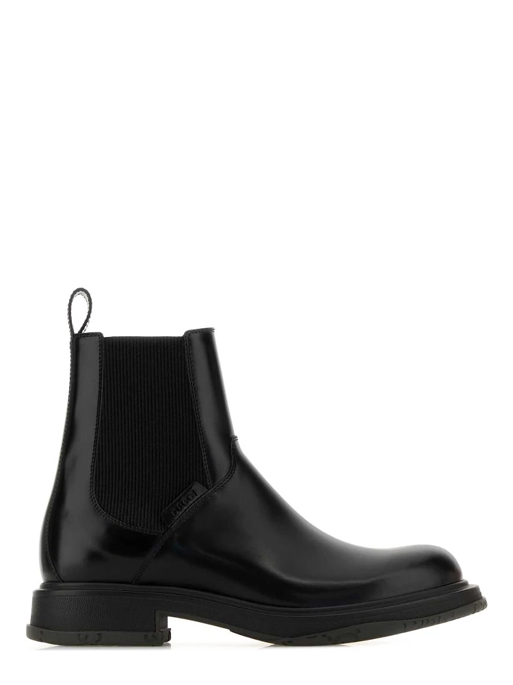 LEATHER UPPER AND RUBBER SOLE BOOTIE