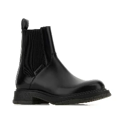 LEATHER UPPER AND RUBBER SOLE BOOTIE